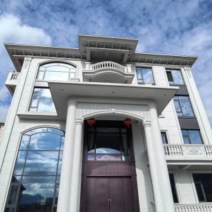 乐山白麻别墅外墙干挂石材效果示例