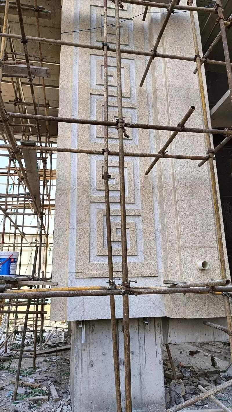 乐山 黄金麻花岗岩别墅外墙干挂回纹造型效果