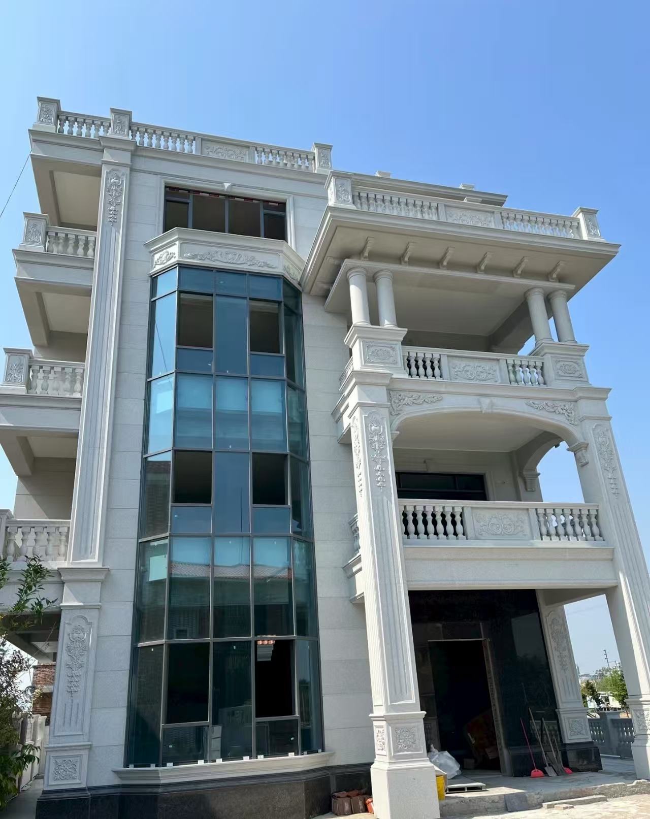 乐山 白麻花岗岩别墅外墙干挂效果展示