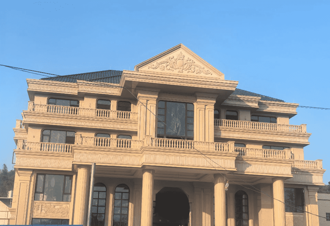 乐山黄金麻别墅外墙干挂石材效果示例